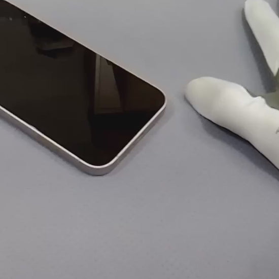 A gloved hand swiping a phone screen